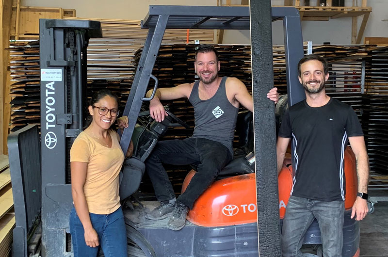 Daniel Bellerose, centre, seen here with some of his crew, founded Arbres et Bois specializing in Yakisugi burned wood.